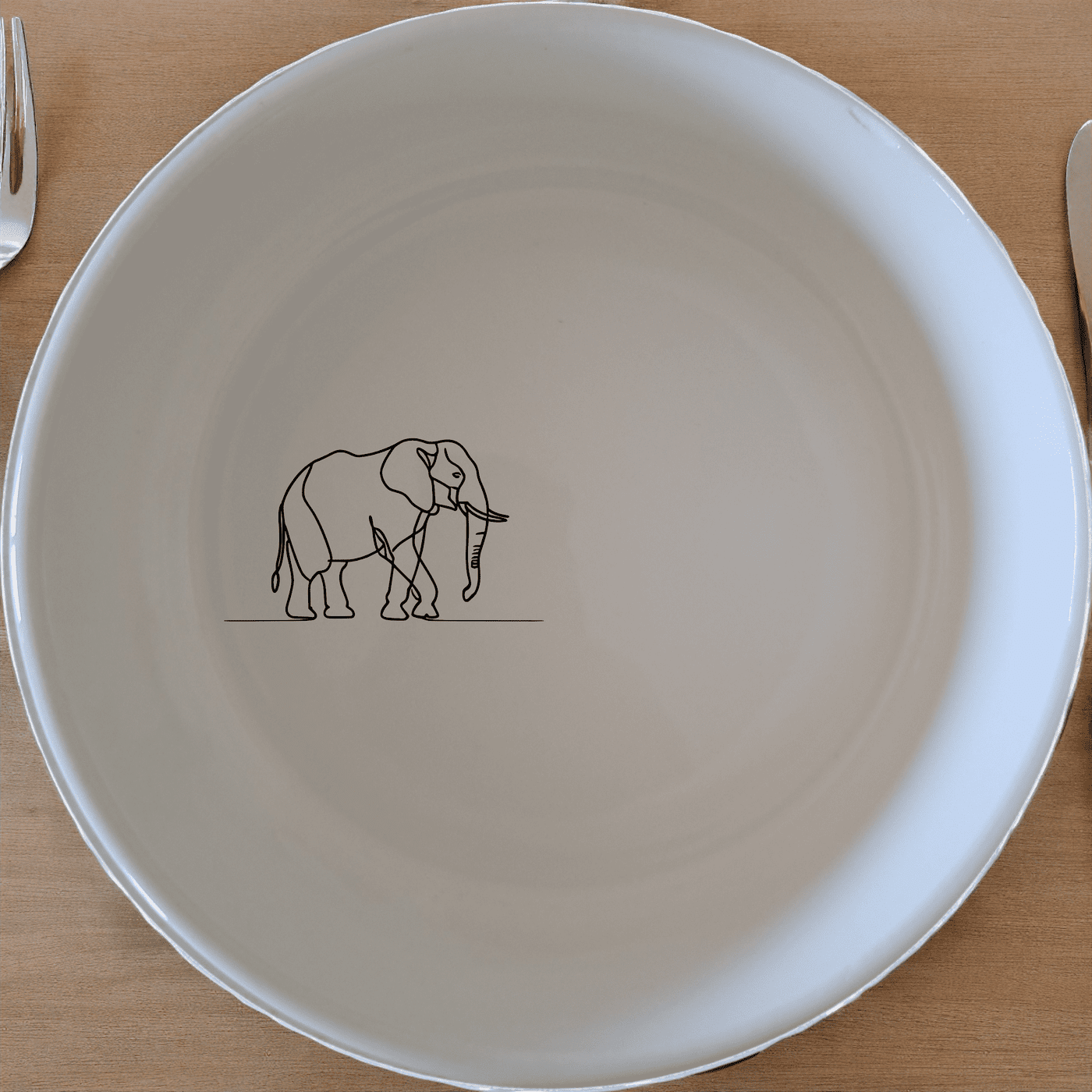 The Silhouette Big Five African Elephant Bowl Set of 4 features a minimalist design perfect for modern kitchens and dining spaces.