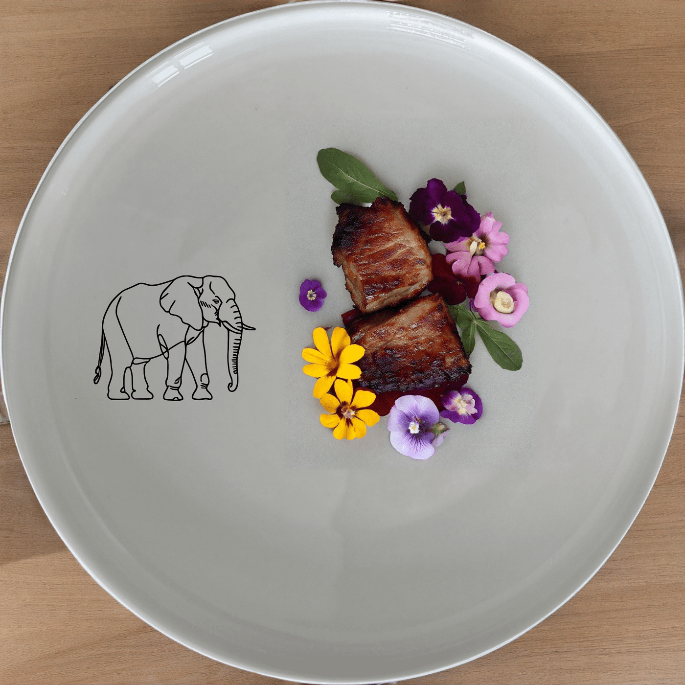 The Silhouette Big Five Elephant Dinner Plate Set of 4 features elegant laser-etched designs perfect for any dining occasion.