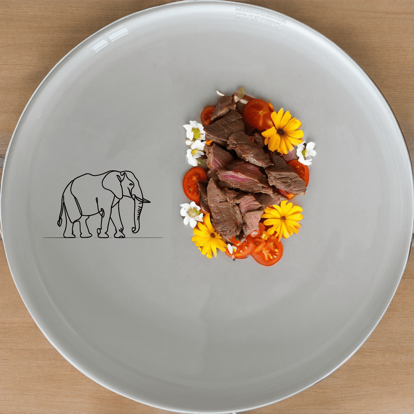 The Silhouette Big Five Elephant Dinner Plate Set of 4 features a minimalist design perfect for modern dining. Crafted from durable ceramic, these plates are both dishwasher and microwave safe, making them ideal for everyday use.