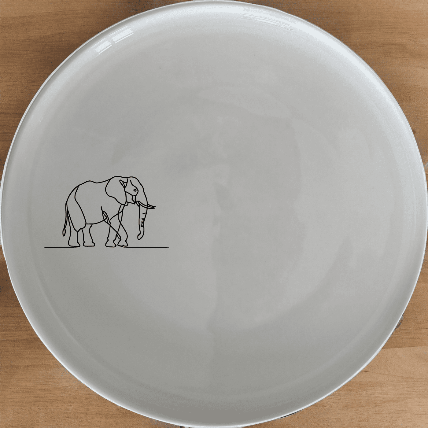The Silhouette Big Five African Elephant Dinner Plate Set of 4 adds a touch of wildlife elegance to your dining table. Crafted from durable ceramic, these plates feature a subtle yet striking silhouette of an African elephant, perfect for nature lovers and those who appreciate unique tableware.