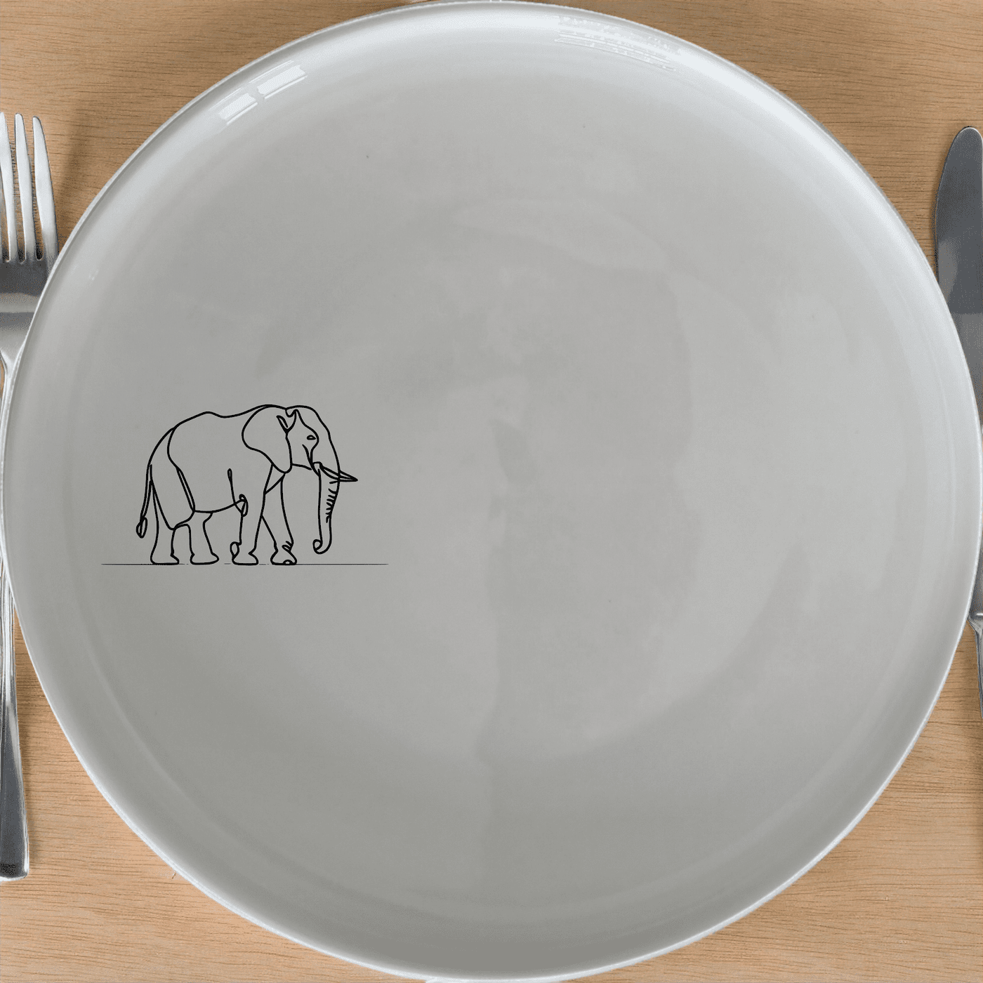 The Silhouette Big Five Elephant Side Plate Set of 4 adds a touch of wildlife elegance to your dining table with its minimalist design.