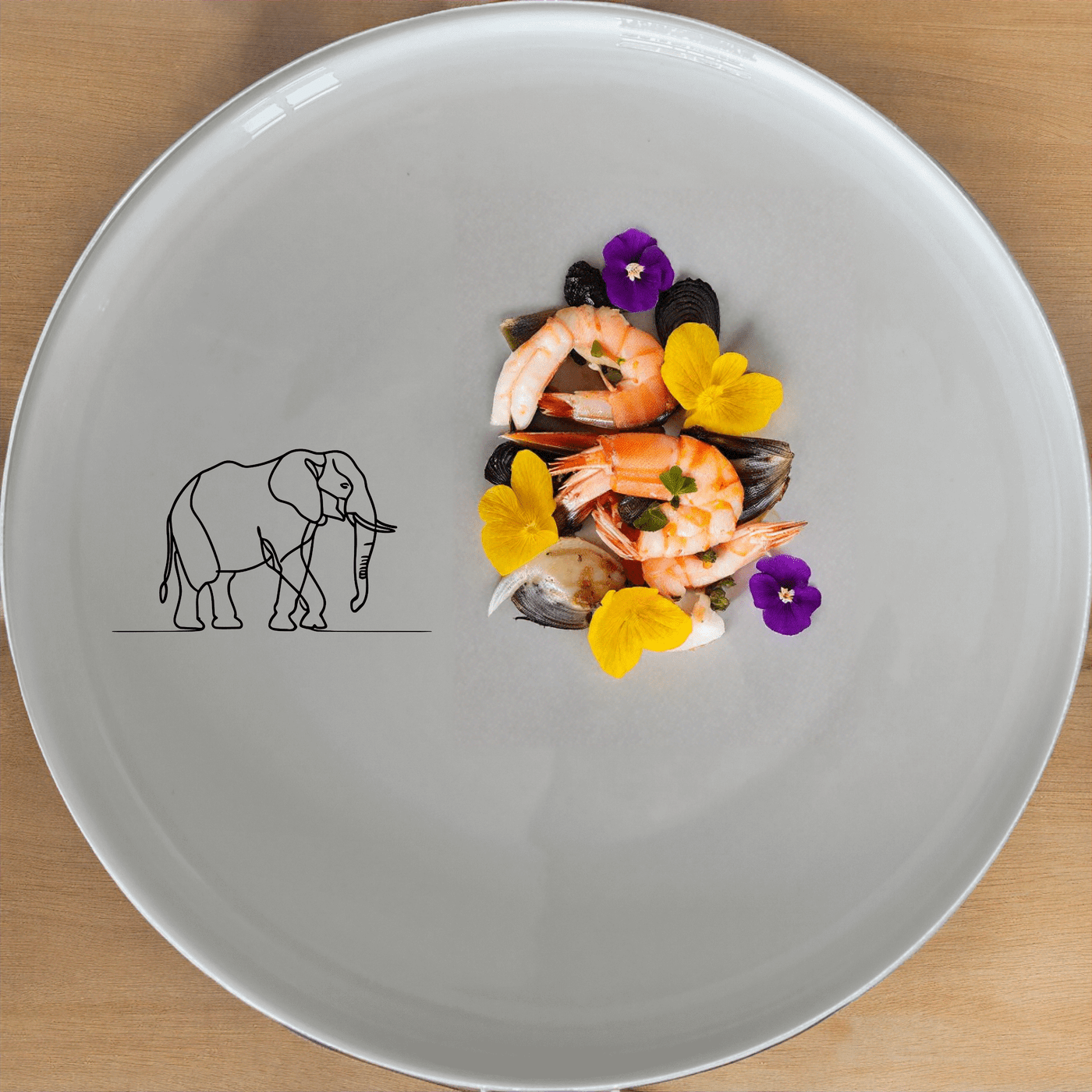 The Silhouette Big Five African Elephant Side Plate Set of 4 features a minimalist design perfect for modern dining. Crafted from durable ceramic, these plates are both dishwasher and microwave safe.
