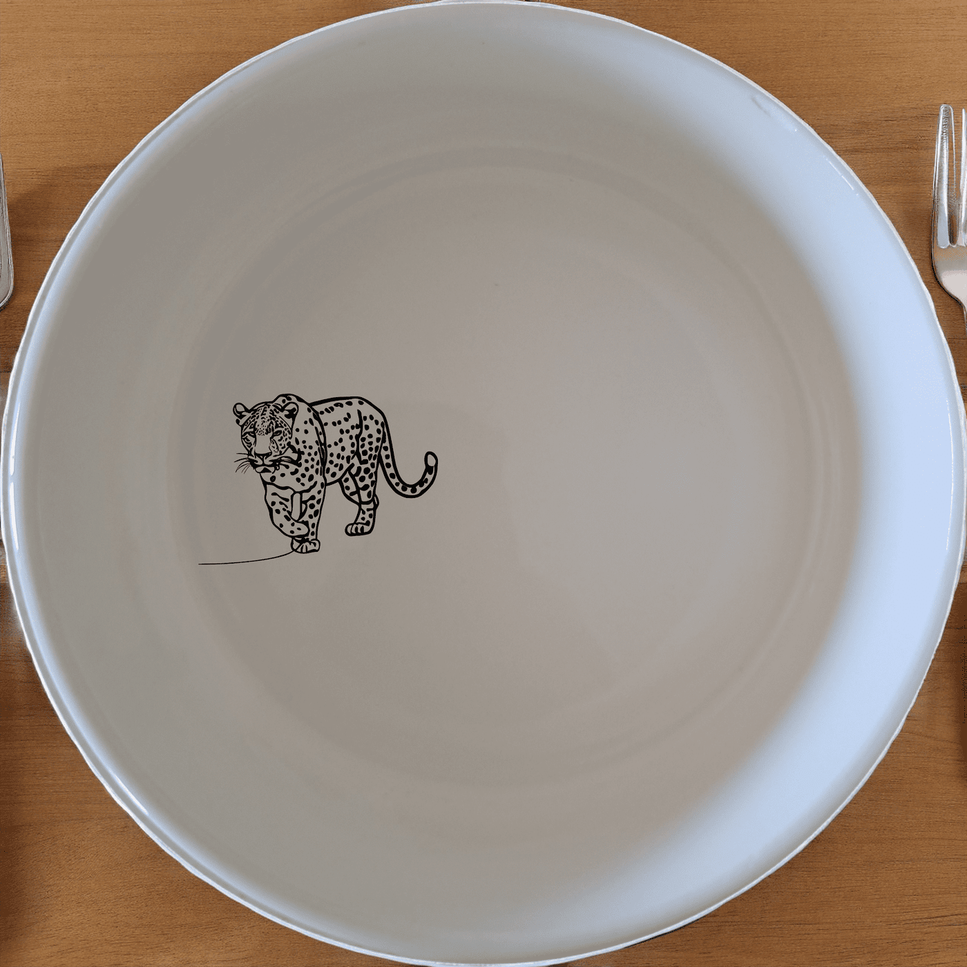 The Silhouette Big Five African Leopard Bowl Set of 4 features elegant leopard designs on white ceramic bowls, perfect for a stylish dining experience.