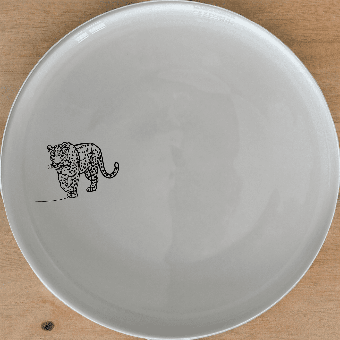 The Silhouette Big Five African Leopard Dinner Plate Set of 4 features elegant leopard designs for a stylish dining experience.
