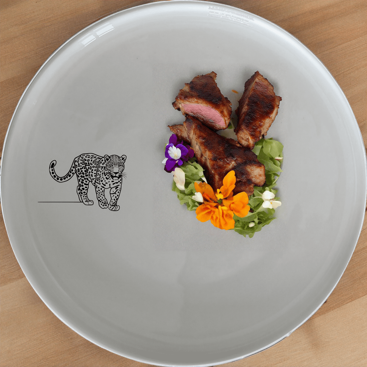 The Silhouette Big Five African Leopard Dinner Plate Set of 4 features a striking silhouette design, perfect for adding a touch of wild elegance to your dining experience.