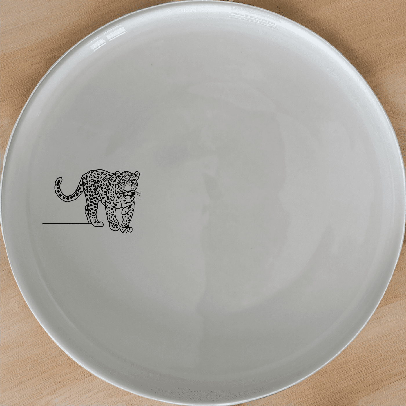 The Silhouette Big Five African Leopard Side Plate Set of 4 adds a touch of wildlife elegance to your dining table with its sleek, minimalist design.