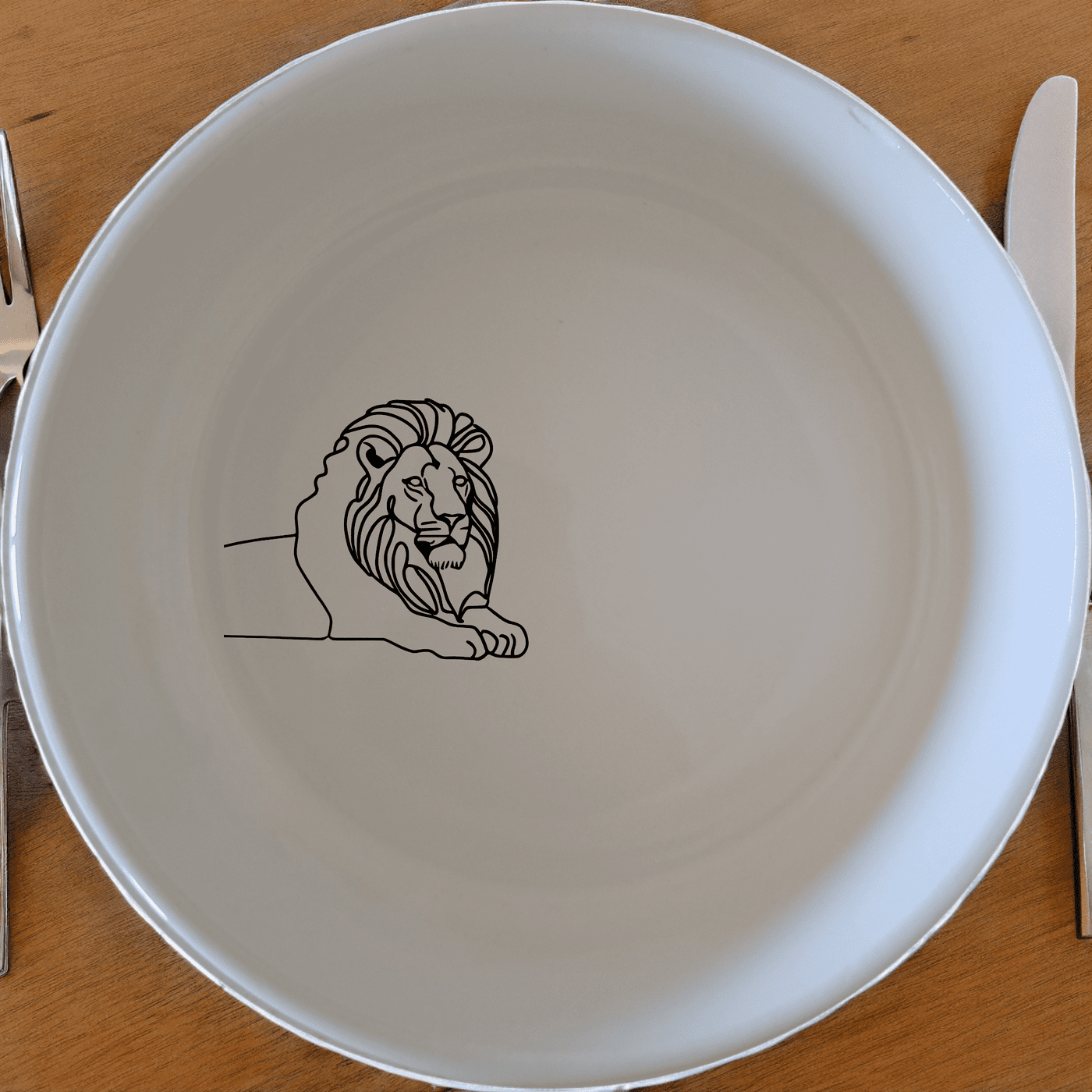 The African Lion Silhouette Bowl Set of 4 features a striking design perfect for any dining table.