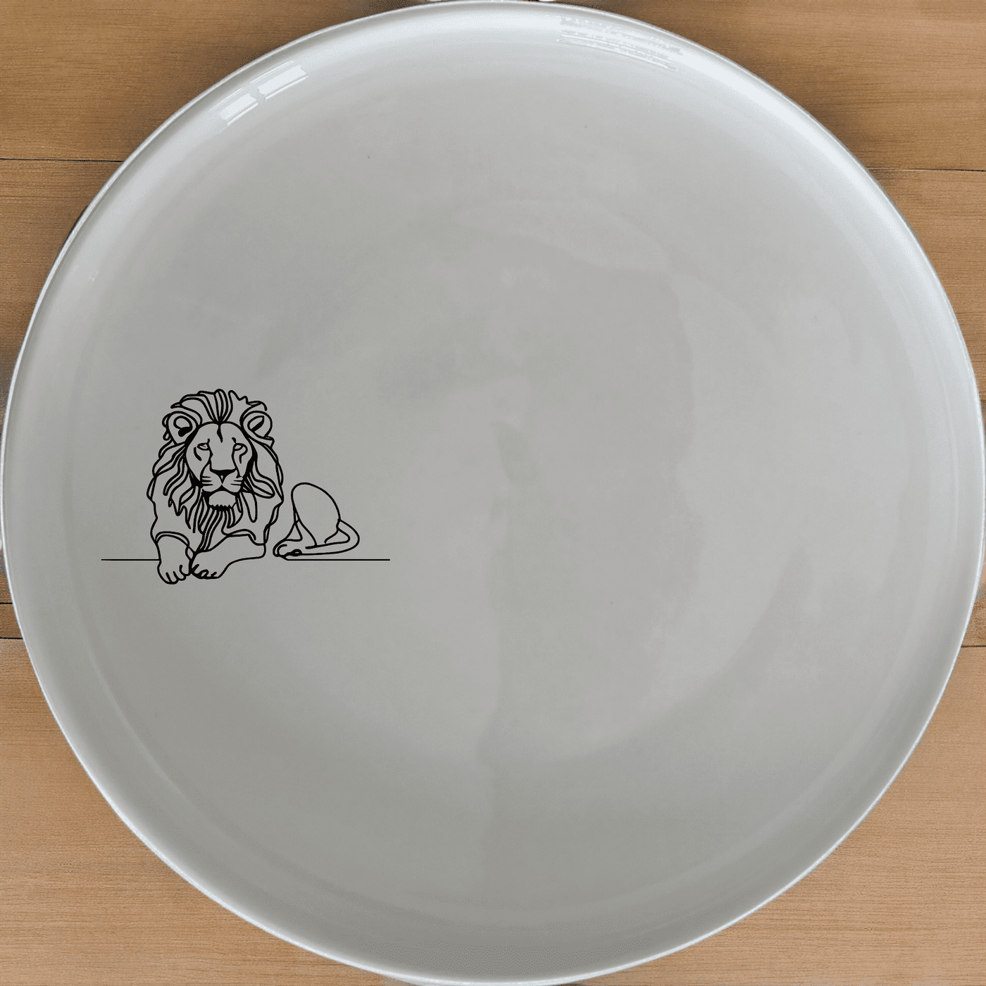 The African Lion Dinner Plate Set of 4 features a sleek silhouette design, perfect for modern dining and everyday use.