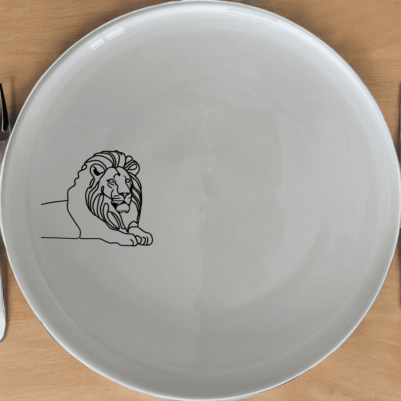 The African Lion Side Plate Set of 4 adds a touch of wild elegance to your dining table with its sleek silhouette design.
