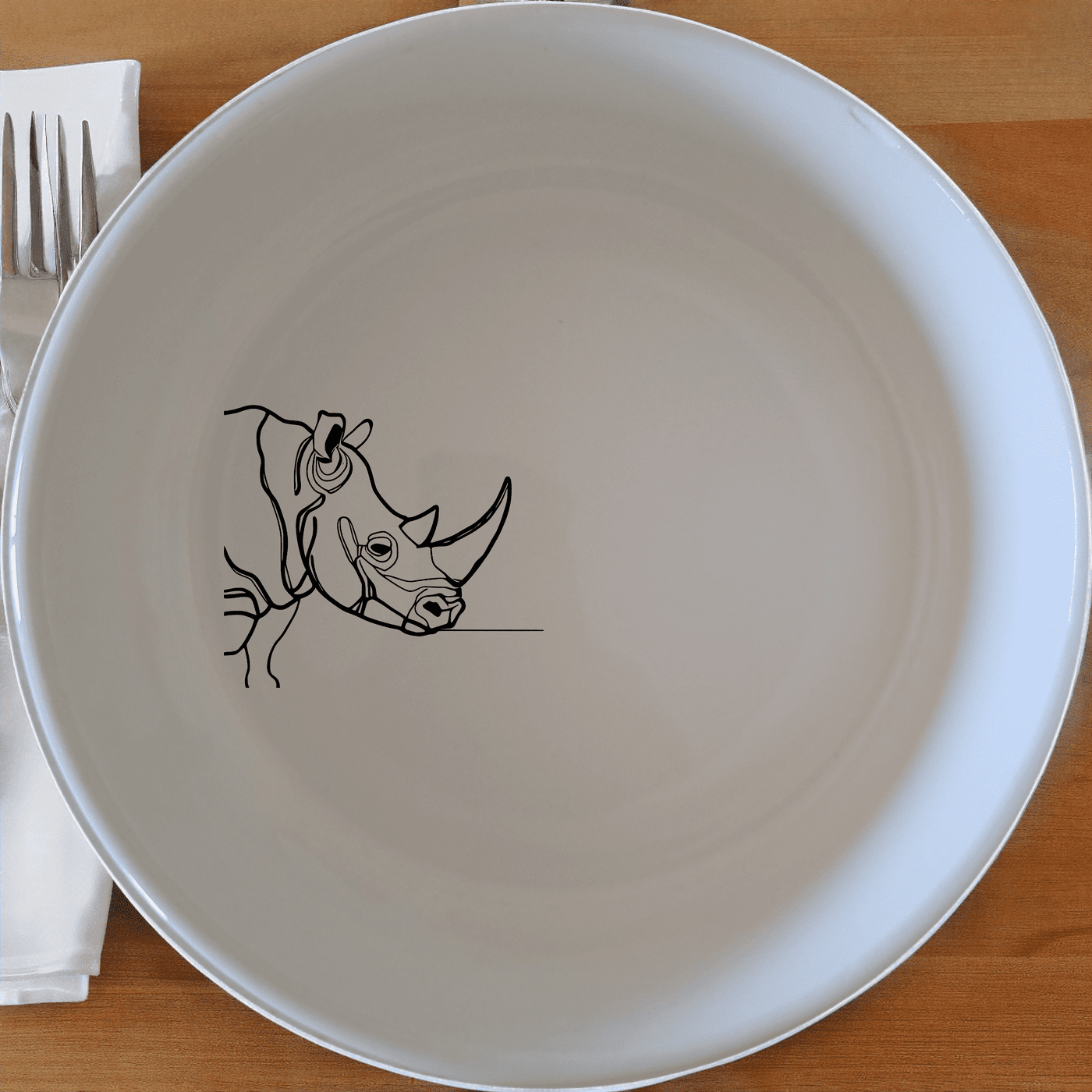 The Silhouette Big Five African Rhino Bowl Set of 4 features a striking rhino silhouette design, perfect for adding a touch of wildlife elegance to your dining table.