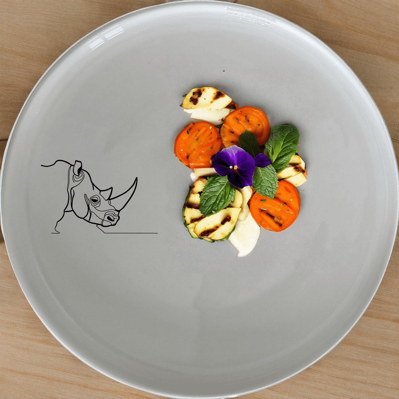 The Silhouette Big Five African Rhino Dinner Plate Set of 4 features elegant laser-etched designs for a sophisticated touch to your dining experience.