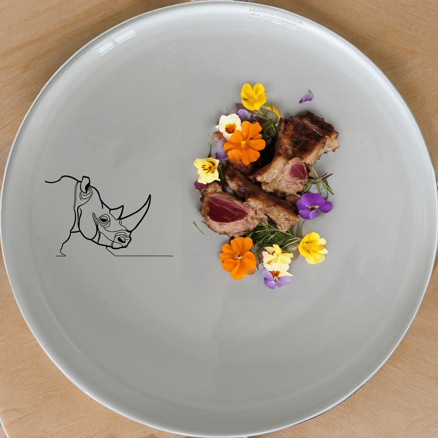 The Silhouette Big Five African Rhino Side Plate Set of 4 features a striking rhino silhouette design, perfect for adding a touch of wildlife elegance to your dining table.