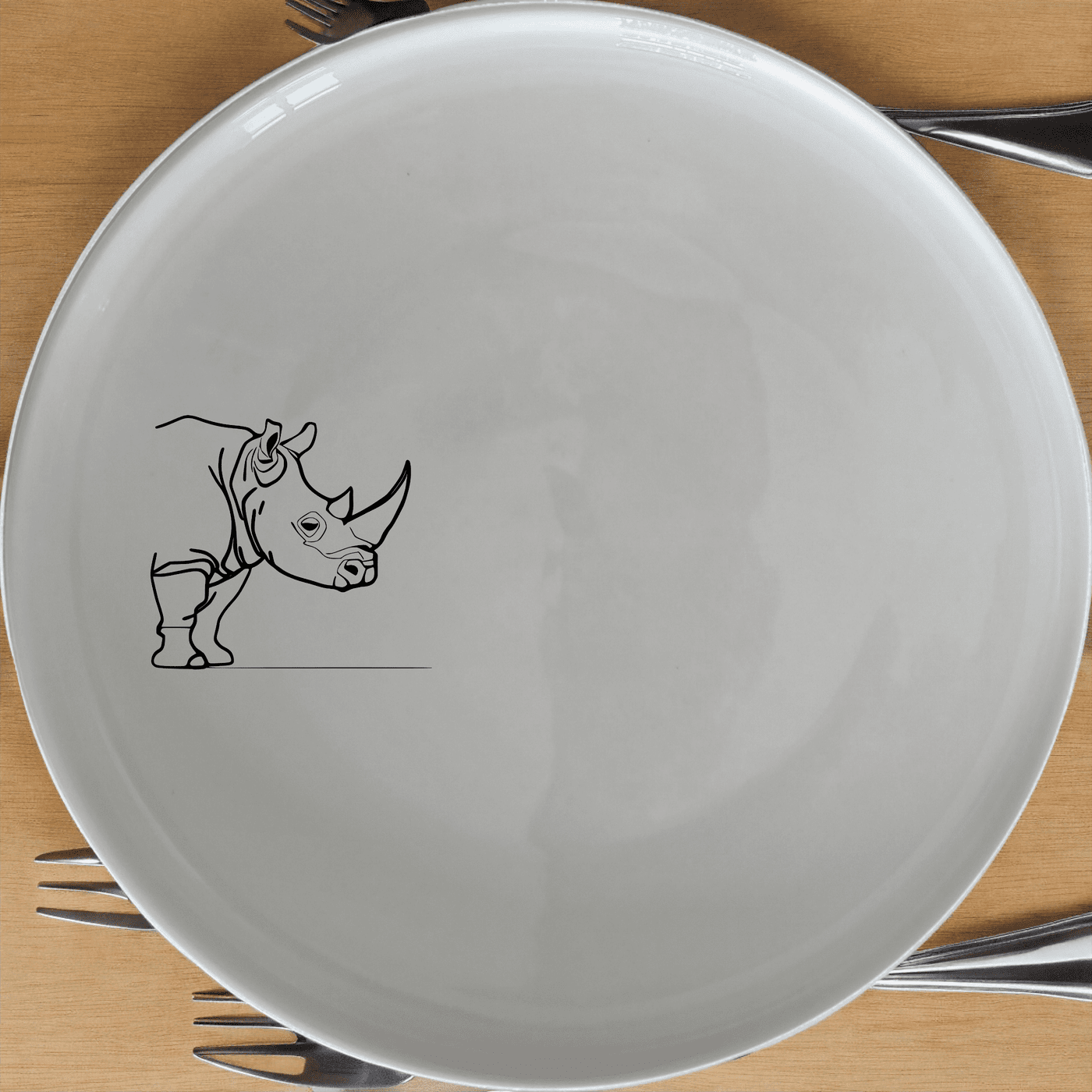 The Silhouette Big Five African Rhino Side Plate Set of 4 features a minimalist design perfect for modern dining.