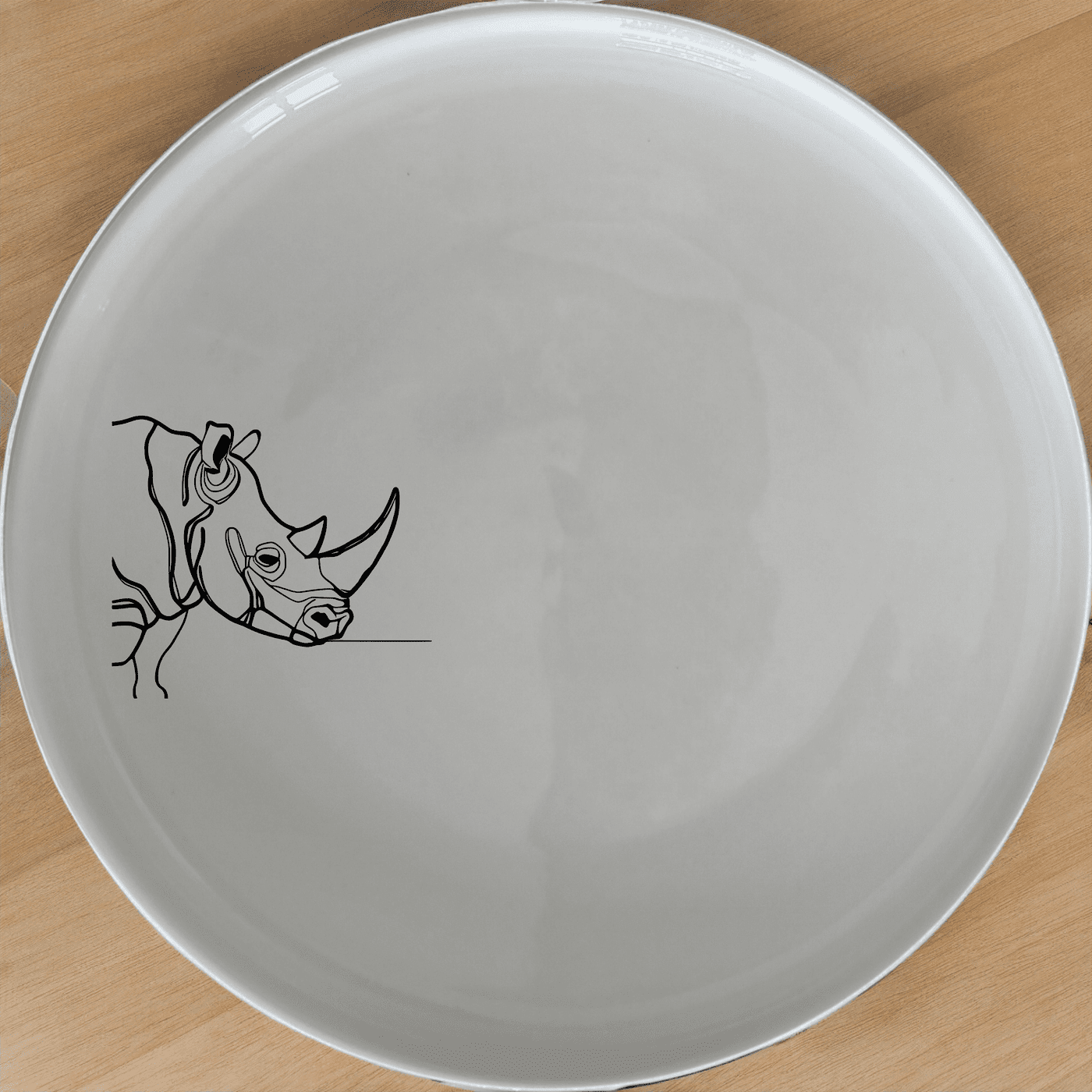 The Silhouette Big Five African Rhino Side Plate Set of 4 adds a touch of wildlife elegance to your dining table with its sleek, minimalist design.
