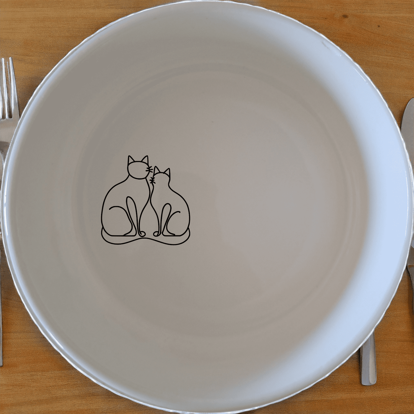 The Sillouhette Fat Curvey Cats Bowl Set of 4 - Range 3 is a charming and stylish addition to any kitchen, perfect for cat lovers.
