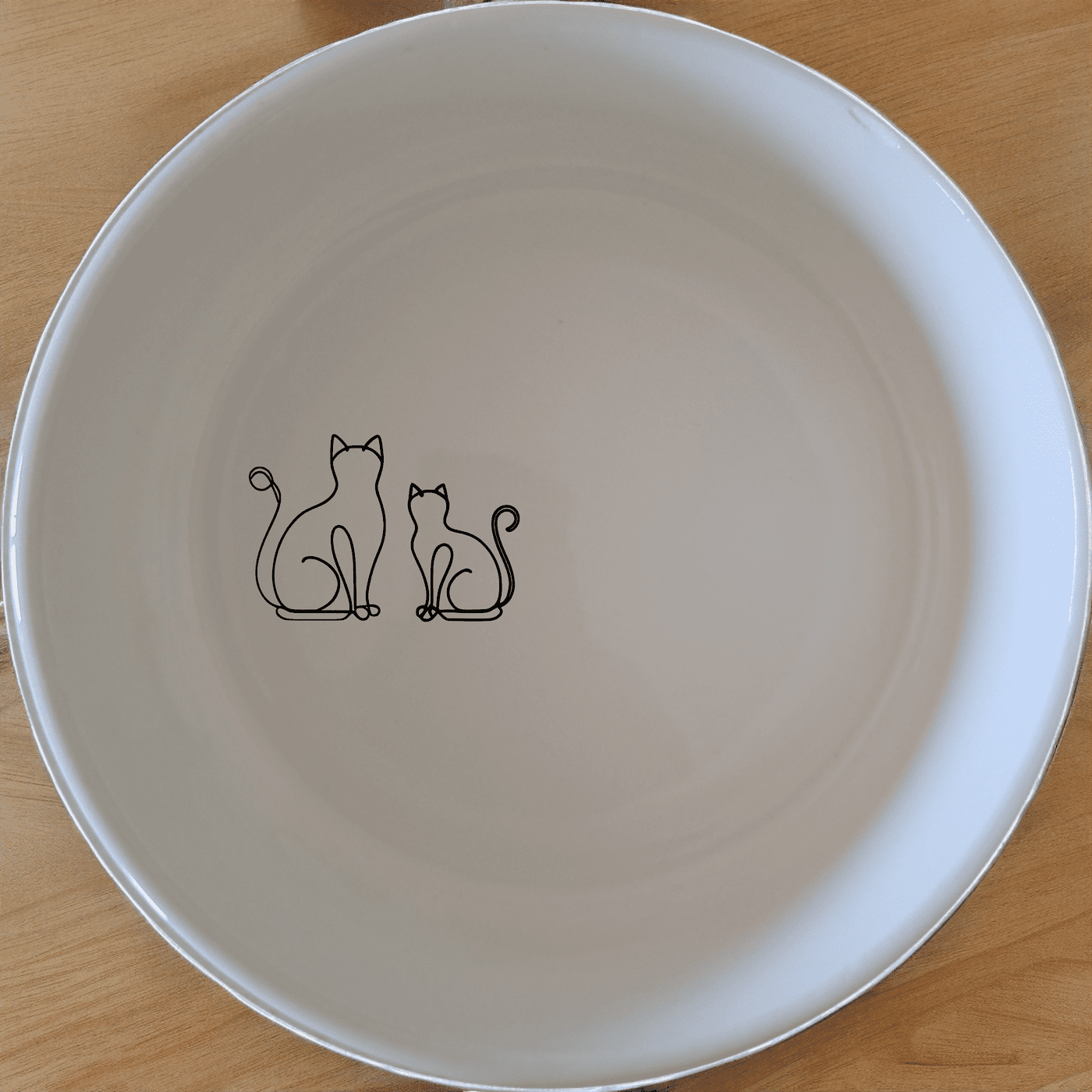 The Sillouhette Fat Curvey Cats Bowl Set of 4 - Range 4 is a charming and stylish addition to any kitchen, featuring elegant cat silhouettes.