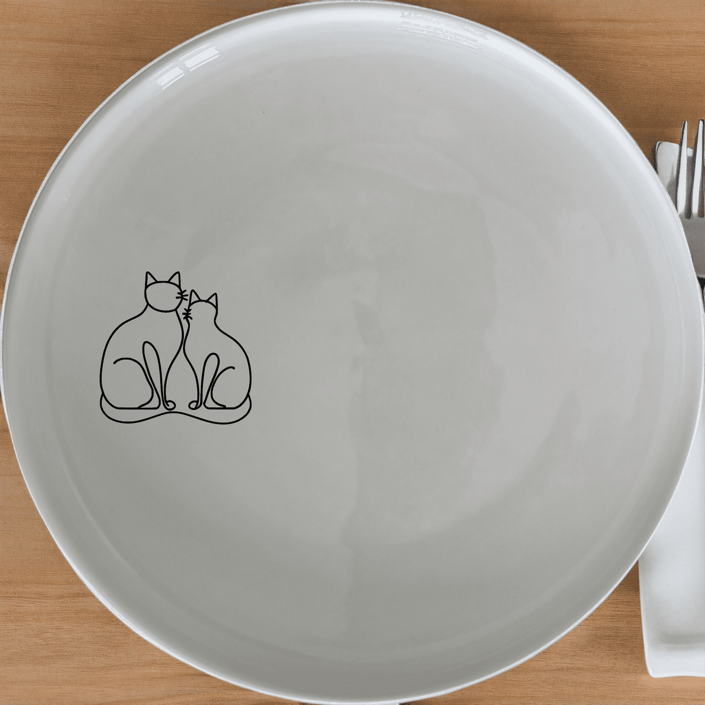 The Silhouette Fat Curvey Cats Dinner Plate Set of 4 - Range 3 features a charming design perfect for cat lovers. These elegant plates add a touch of whimsy to any dining table.