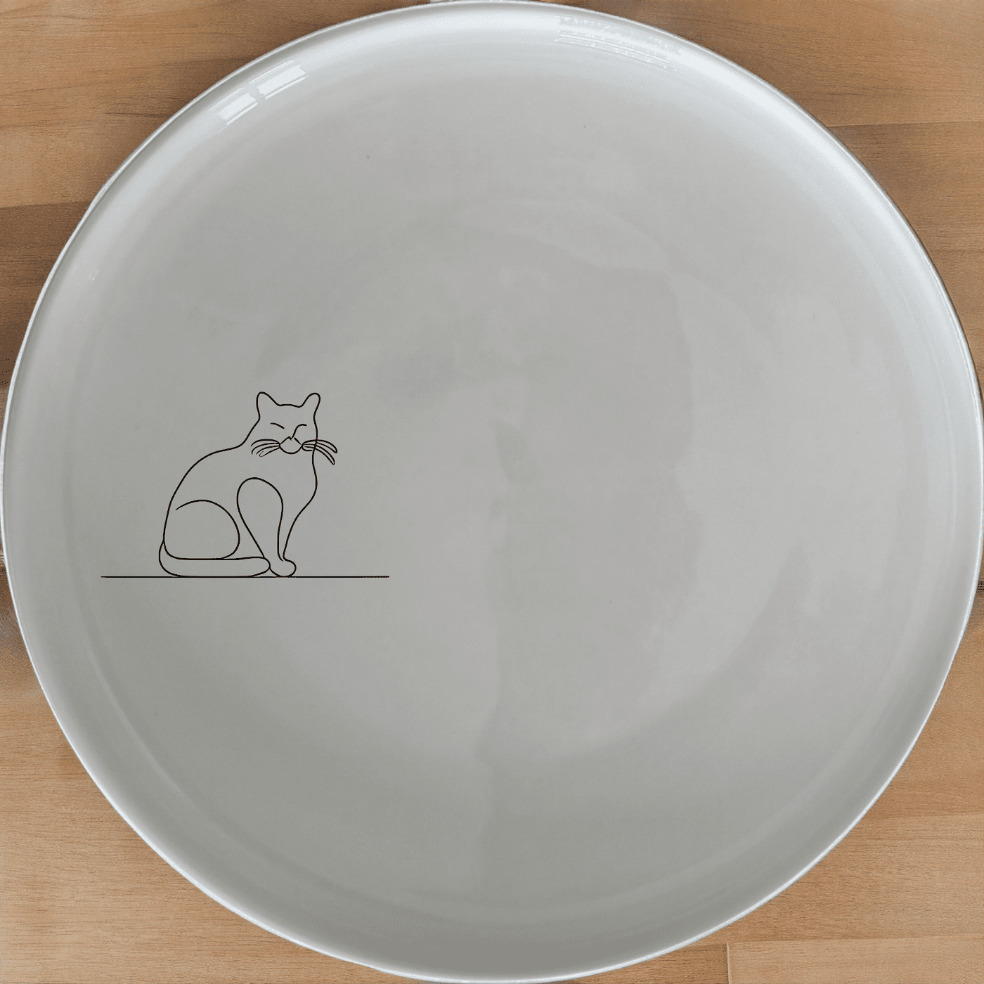 The Silhouette Fat Curvey Cats Side Plate Set of 4 - Range 1 is a charming and stylish addition to any dining table. These elegant ceramic plates feature a unique and playful design that will add a touch of whimsy to your meals.