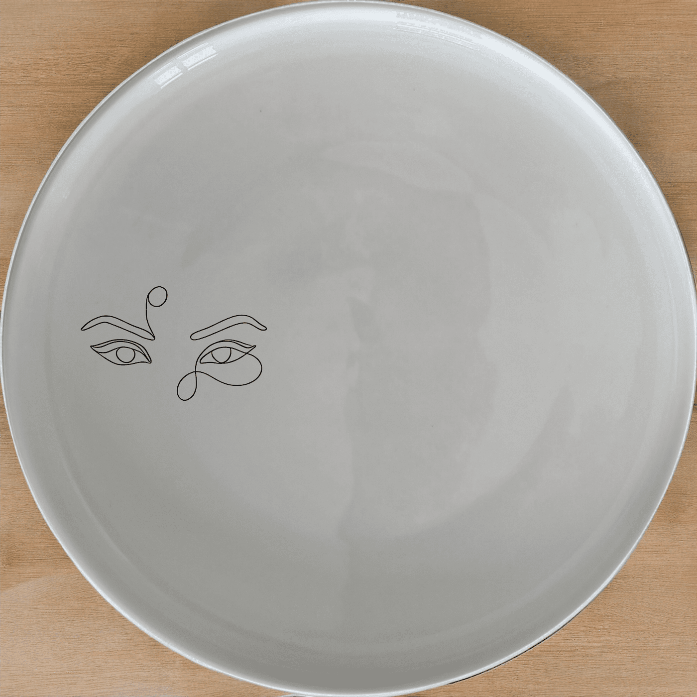 Smokey Glaring Womens Eyes Side Plate Set of 4 - Range 1 offers a unique and artistic design perfect for any modern kitchen. Crafted from durable ceramic, these plates are both dishwasher and microwave safe, making them ideal for everyday use.