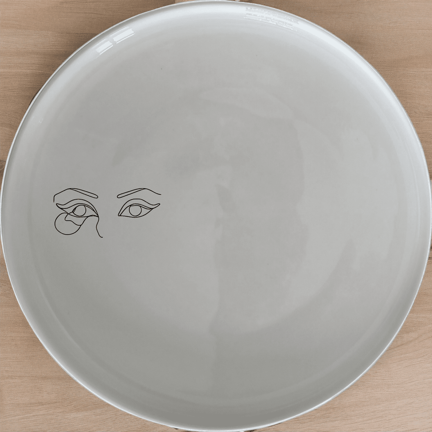Smokey Glaring Womens Eyes Side Plate Set of 4 - Range 3 is a captivating and artistic addition to any dining table, perfect for those who appreciate unique and expressive designs.