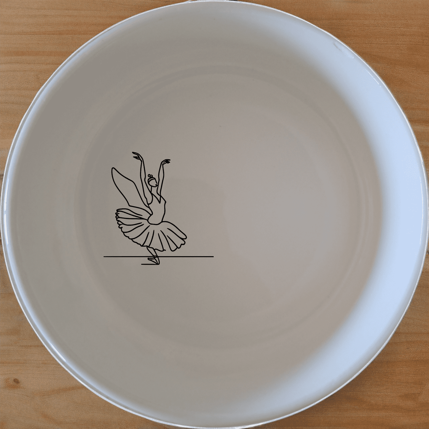 Swan Morphing Ballet Dancer Bowl Set of 4 - Range 1 is a beautifully designed set of four white ceramic bowls, each featuring an elegant swan morphing into a ballet dancer design. Perfect for adding a touch of artistry to your dining experience.
