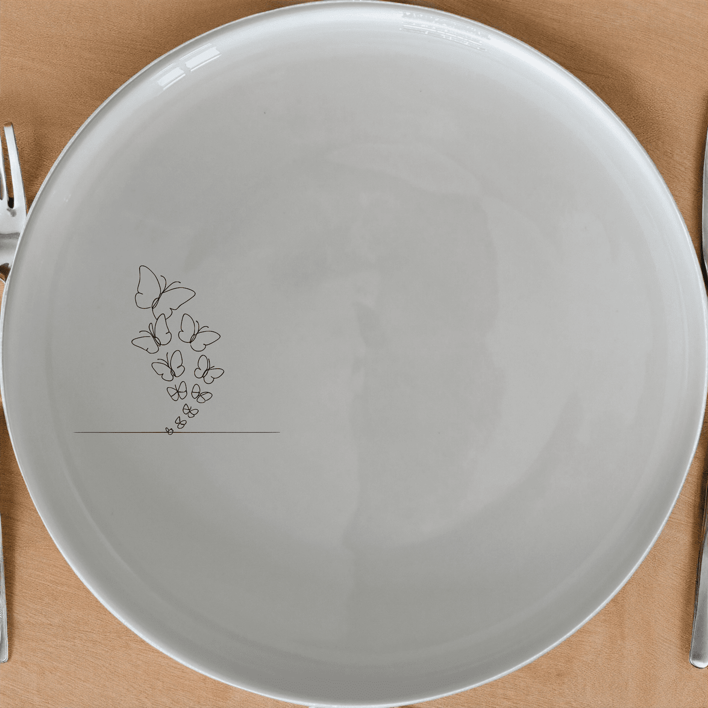 Swarm Delicate Butterflies Dinner Plate Set of 4 - Range 2 is a stunning set of four dinner plates featuring an intricate laser-etched butterfly design. Perfect for any dining occasion.