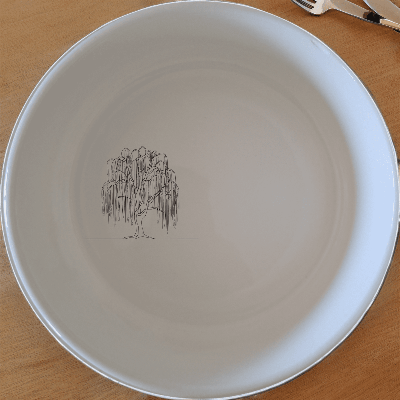 The Weeping Willow Tree Bowl Set of 4 - Range 4 is a stunning collection of ceramic bowls, each featuring a delicate laser-etched willow tree design. Perfect for any dining occasion.