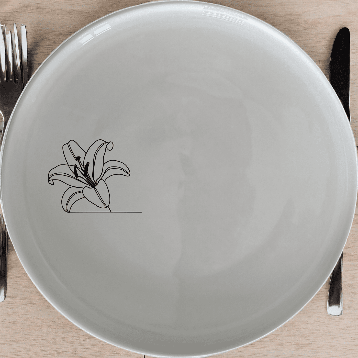 White Easter Lilly Side Plate Set of 4 - Range 4 is a beautiful and elegant set of four side plates featuring a delicate laser-etched Easter lily design on a pristine white ceramic surface.