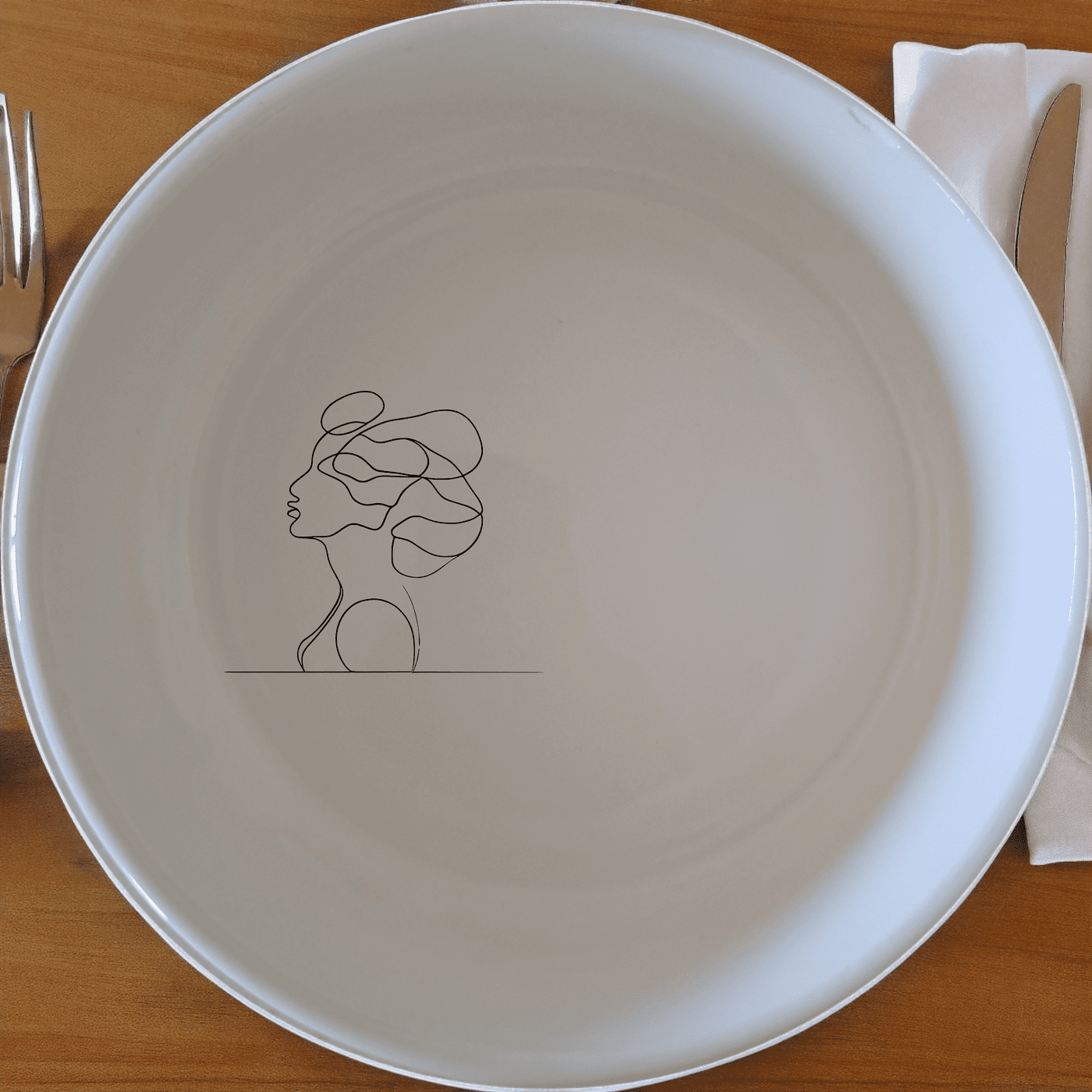 The Woman Faces Hair Bowl Set of 4 features elegant abstract designs perfect for modern dining. Crafted from premium ceramic, these bowls offer durability and style for everyday use.