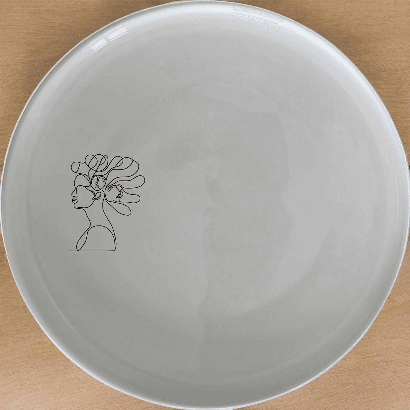 The Woman Faces Hair Dinner Plate Set of 4 features an abstract design, perfect for modern dining. This set includes four elegant dinner plates, each with a unique artistic touch, making it an ideal choice for both everyday use and special occasions.