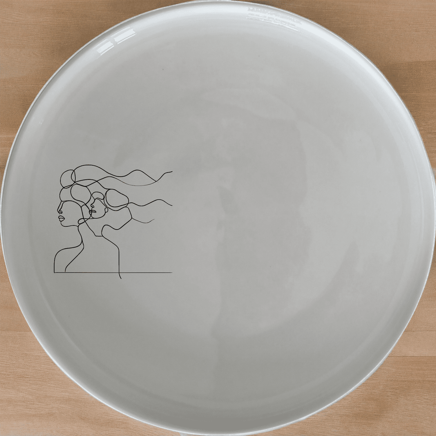 The Woman Faces Hair Dinner Plate Set of 4 features an abstract design that adds a modern touch to your dining experience.
