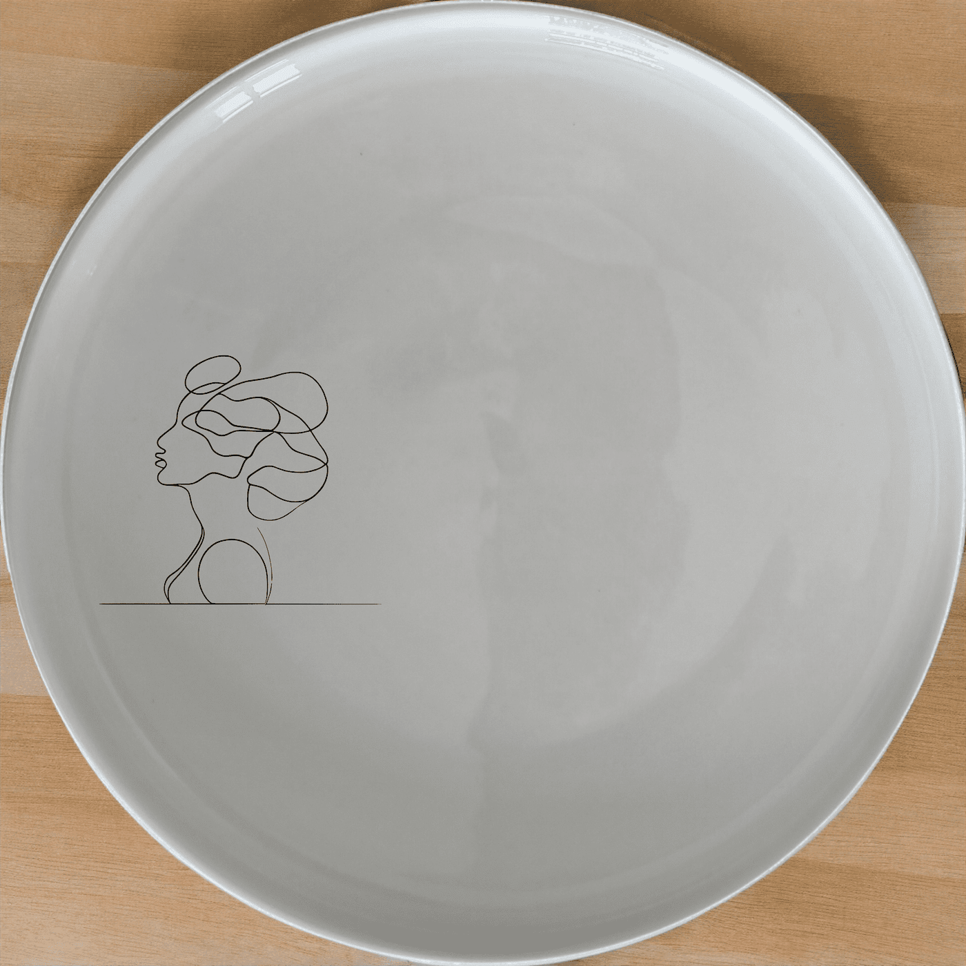 The Woman Faces Hair Side Plate Set of 4 features a minimalist design with elegant abstract lines, perfect for modern dining.