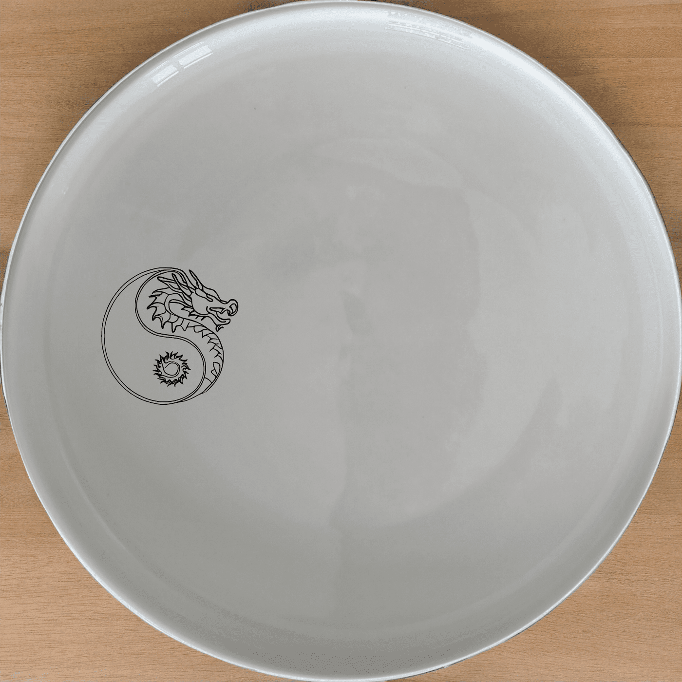 Yingyang Chinese Dragons Side Plate Set of 4 - Range 4 is a stunning set of four elegant side plates featuring intricate Chinese dragon designs. Perfect for adding a touch of cultural sophistication to your dining experience.