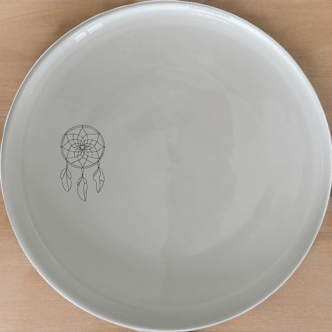 Dreamcatcher Feathers Dinner Plate Set of 4 - Range 1 is a stylish and modern dinner plate set perfect for any dining occasion.