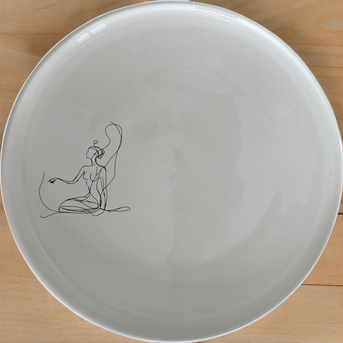 Abstract Kneeling Woman Dinner Plate Set of 4 - Range 1 is a stunning set of four 28cm dinner plates featuring an abstract kneeling woman design.