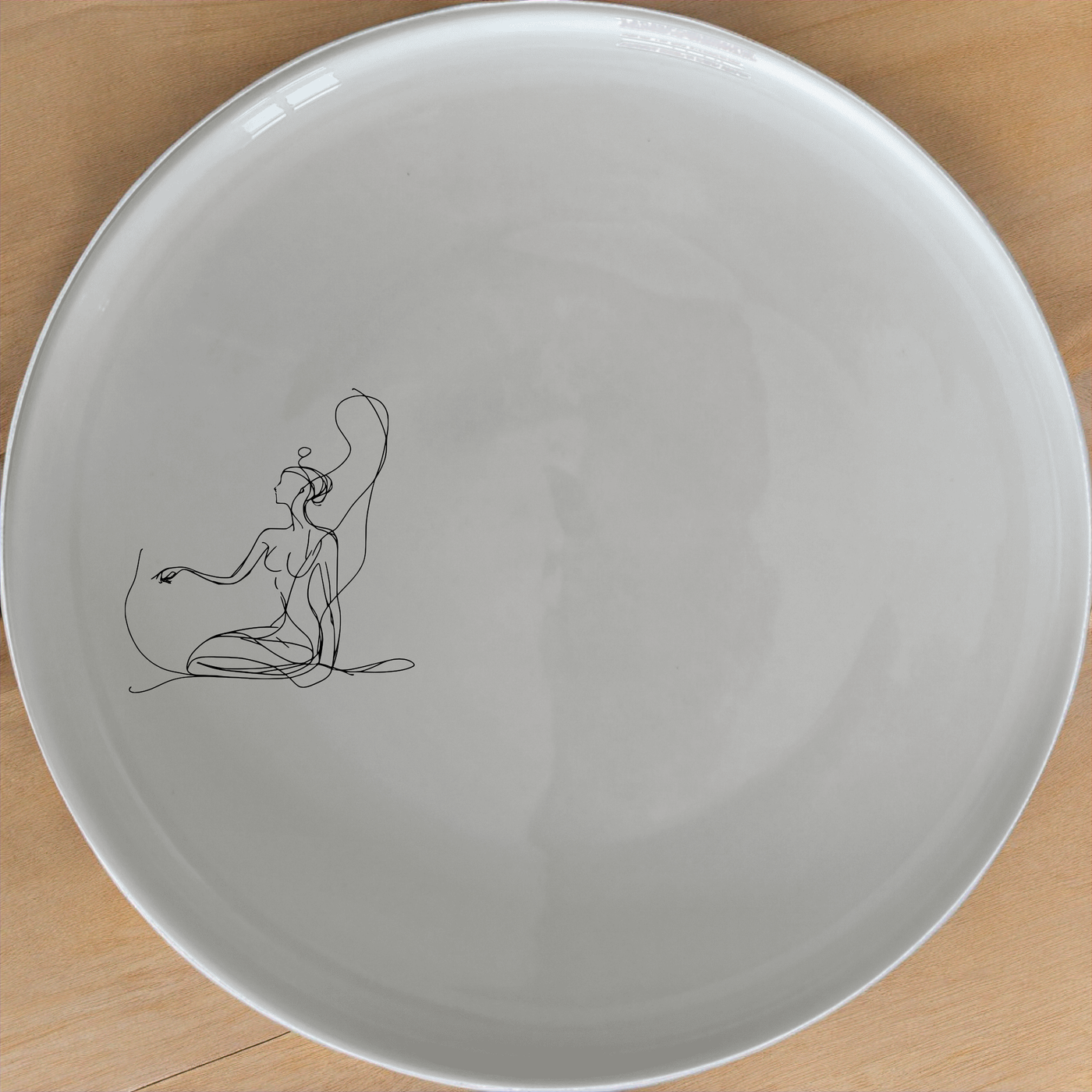 Abstract Kneeling Woman Bowl Set of 4 - Range 1 offers a unique and stylish addition to your dining collection.