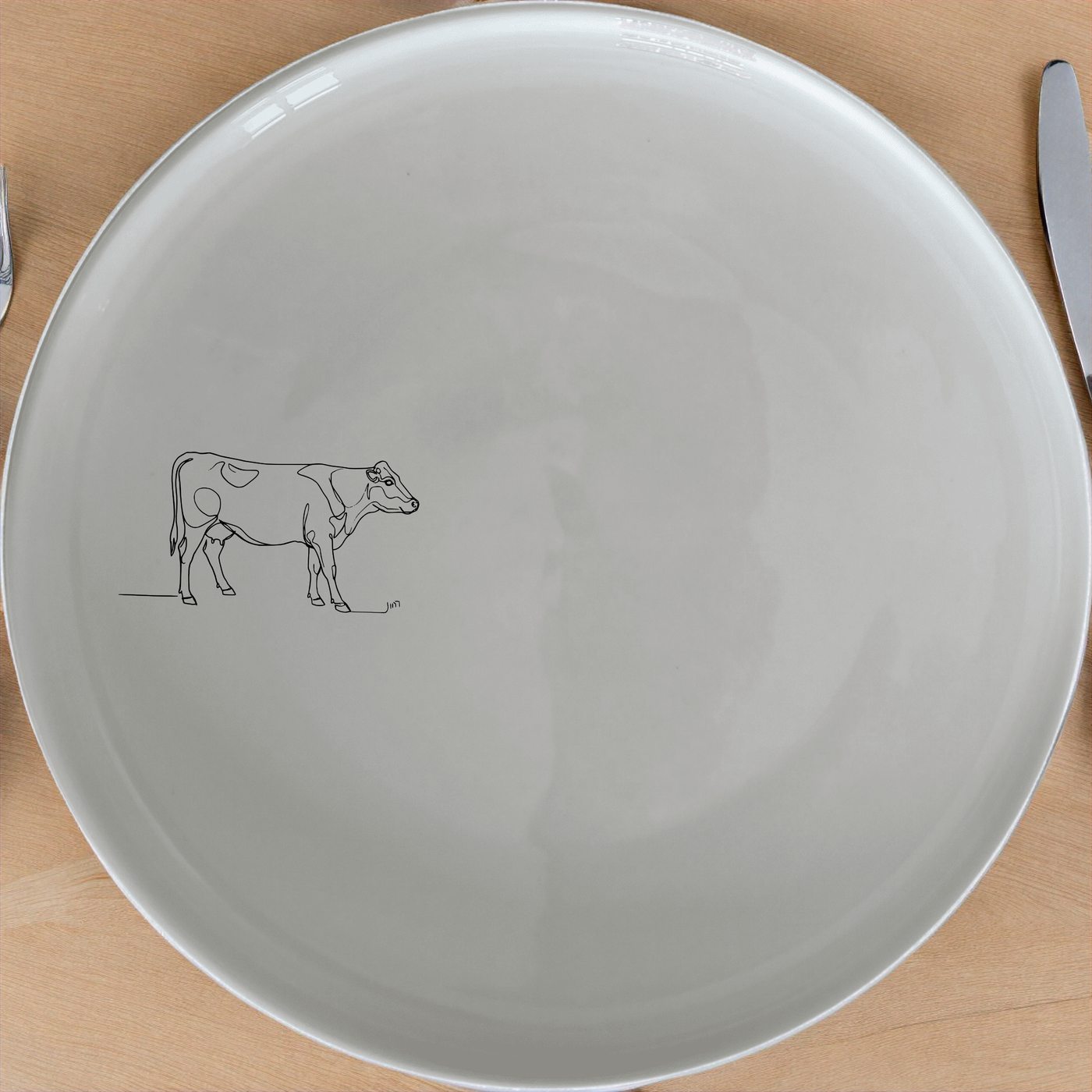 Abstract Farm Cow Dinner Plate Set of 4 - Range 1 is a stylish and modern dinnerware set featuring a minimalist cow illustration. Perfect for everyday use or special occasions.