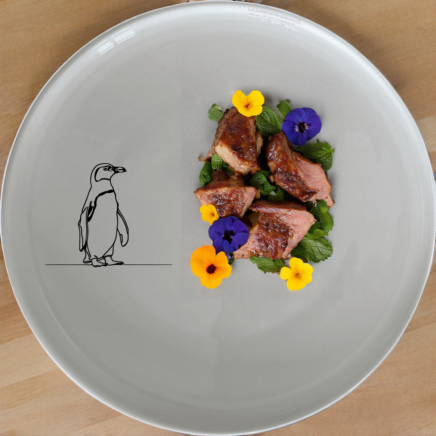 African Penguin Dinnerware Set of 12 - Range 3 features minimalist penguin designs on white ceramic plates, bowls, and side plates for a chic and modern dining experience.