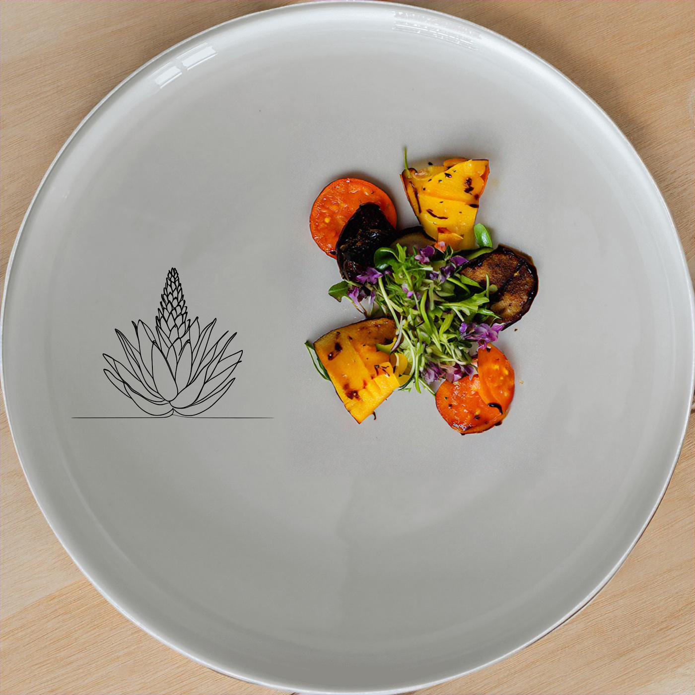 The Aloe Ferox Flower Spike Dinnerware Set of 12 - Range 1 features a modern, minimalist design with a subtle aloe ferox flower motif, perfect for elevating any dining experience.
