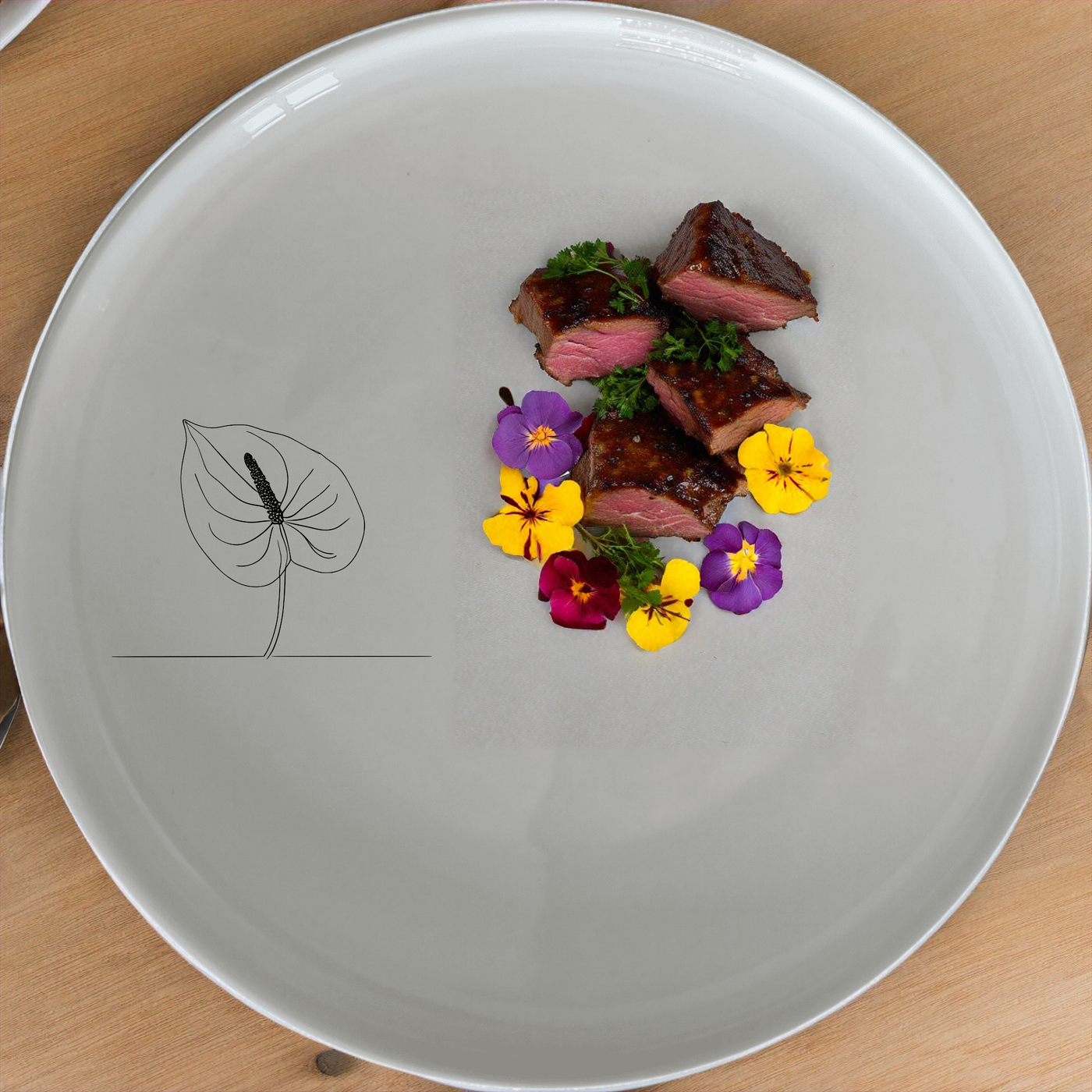Anthurium Clarinervium Dinnerware Set of 12 - Range 4 offers a sleek, modern design perfect for any dining occasion. This set includes dinner plates, side plates, and bowls, all featuring a minimalist anthurium leaf motif. Ideal for both everyday use and special events, this dinnerware set combines style and functionality.