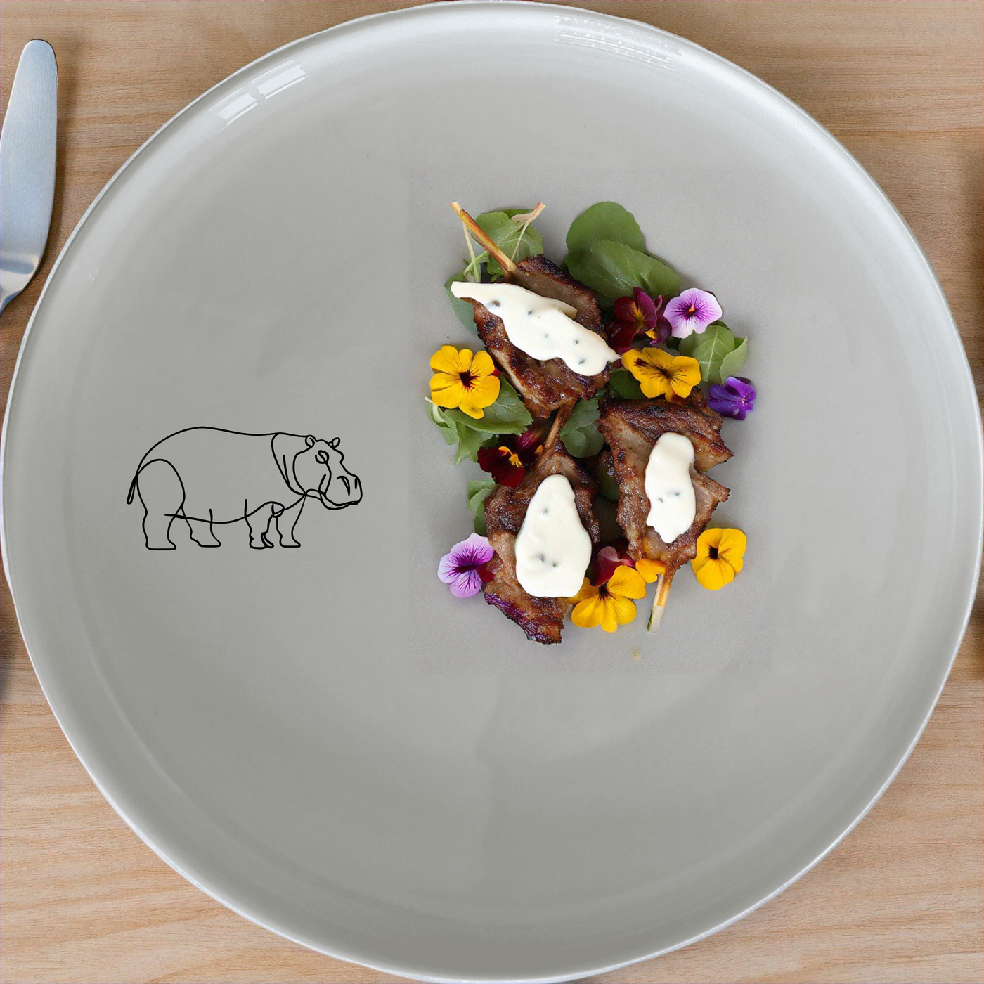 The Curvey Sillohuette Hippo Dinnerware Set of 12 - Range 2 is a charming and stylish addition to any dining table, featuring elegant hippo silhouettes on each piece.
