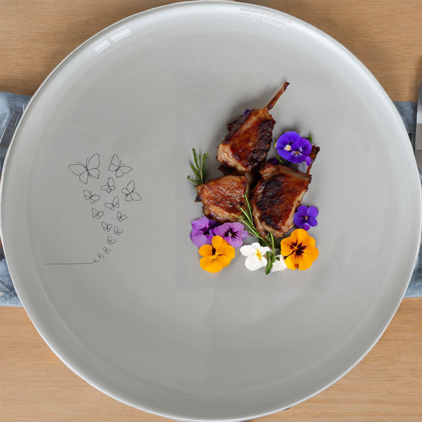 The Delicate Butterflies Dinnerware Set of 12 - Range 4 features a charming butterfly design on white ceramic plates, bowls, and side plates, perfect for adding a touch of elegance to any dining experience.