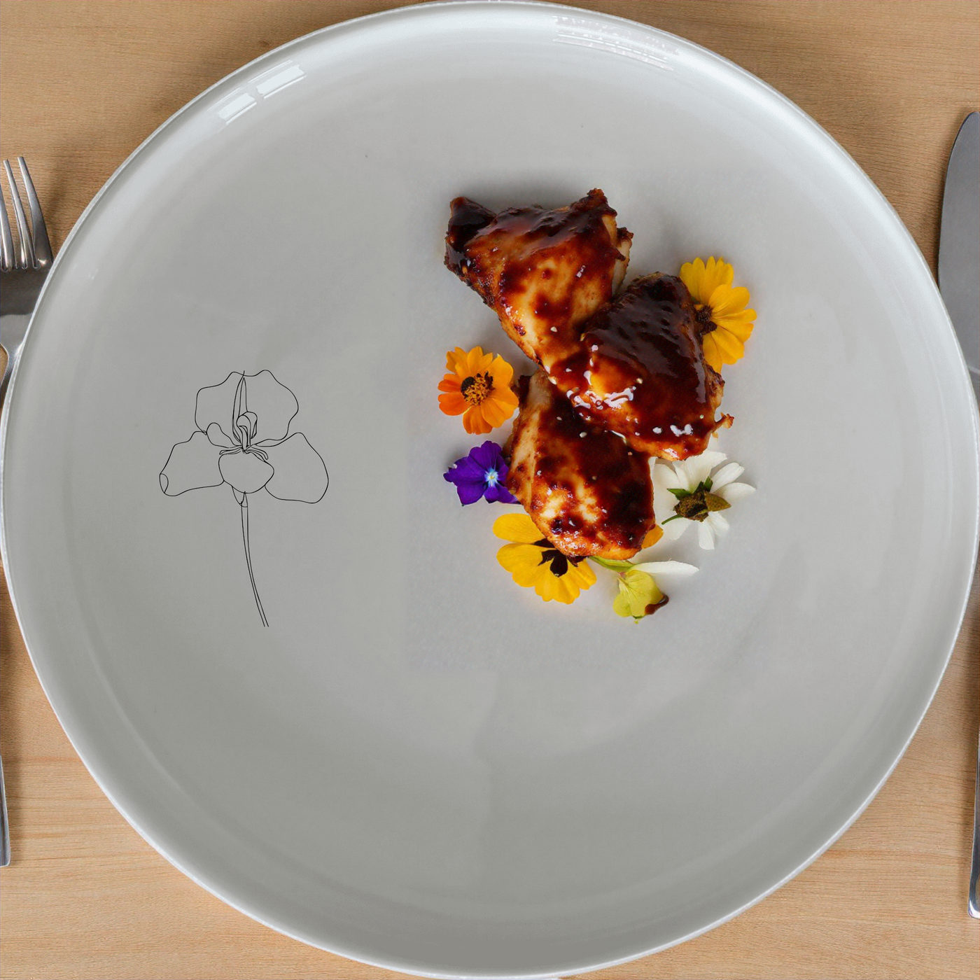 The Delicate Disa Flower Dinnerware Set of 12 - Range 1 brings a touch of elegance to your table with its subtle floral design.