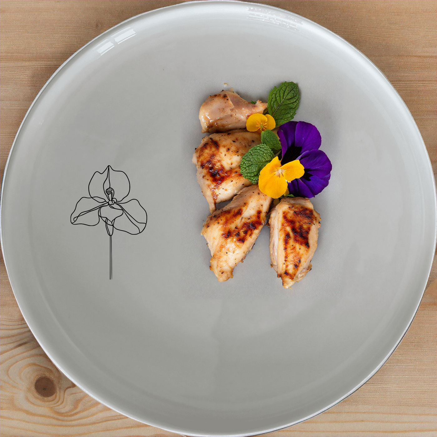 The Delicate Disa Flower Dinnerware Set of 12 - Range 2 features elegant floral designs perfect for any dining occasion.