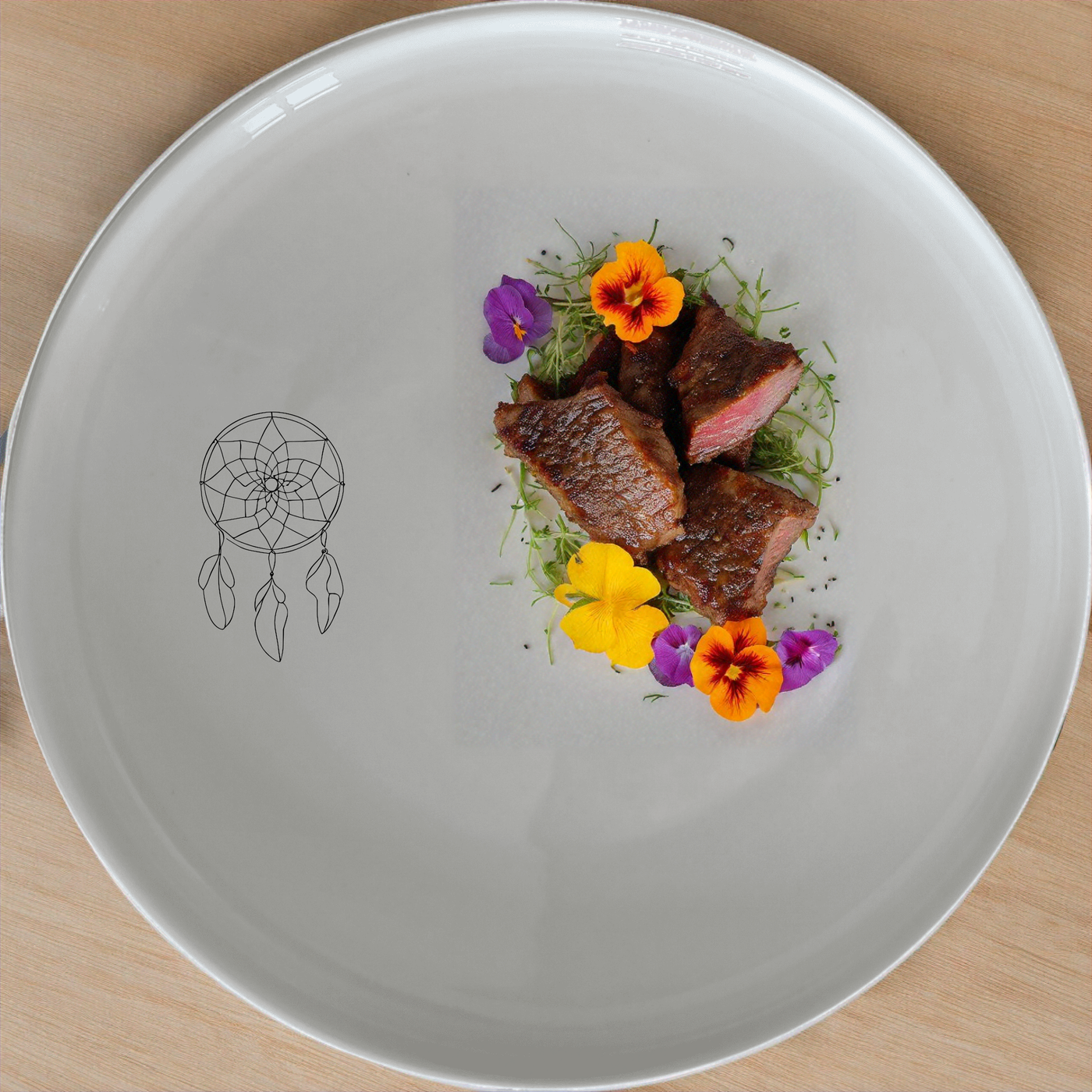 The Dreamcatcher Feathers Dinnerware Set of 12 - Range 1 is a beautiful and unique set that adds a touch of elegance to your dining experience. This set includes four dinner plates, four side plates, and four bowls, all featuring a delicate dreamcatcher design. Perfect for everyday use or special occasions, this set is sure to impress your guests and elevate your dining experience.