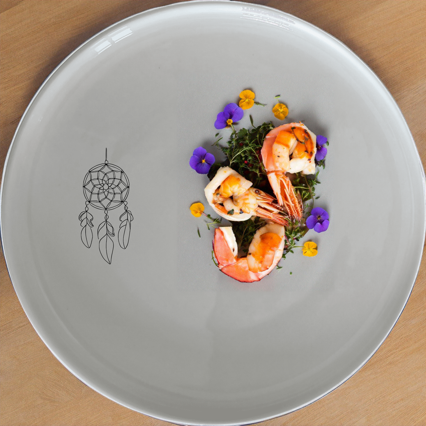 The Dreamcatcher Feathers Dinnerware Set of 12 - Range 2 brings a touch of spiritual elegance to your dining table. This set includes four dinner plates, four side plates, and four bowls, each adorned with a delicate dreamcatcher design. Perfect for everyday use or special occasions, these pieces are crafted from high-quality ceramic and are both dishwasher and microwave safe.