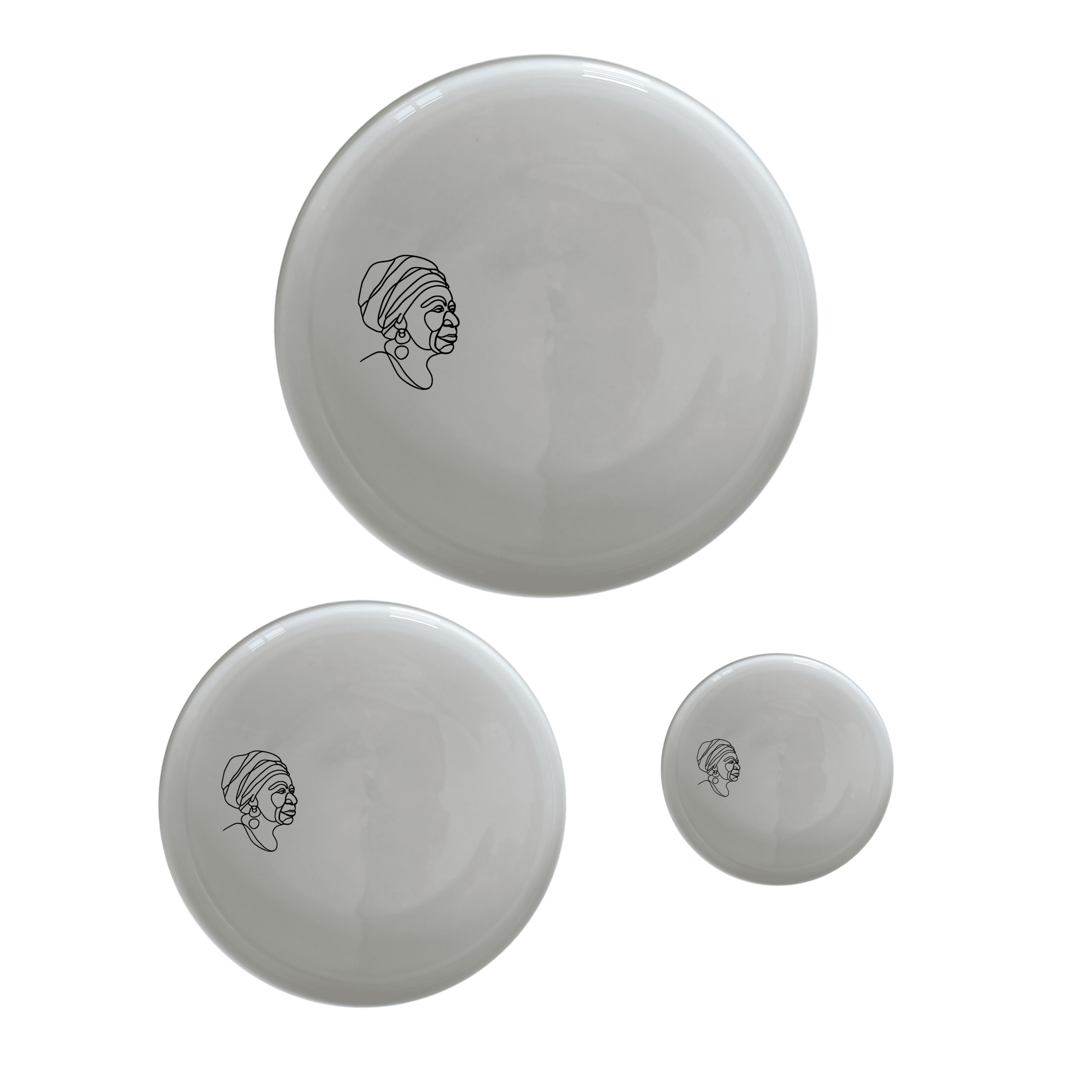 Face Old African Woman Dinnerware Set of 12 - Range 2 is a stunning collection of ceramic plates featuring elegant African-inspired designs. Perfect for any dining occasion.