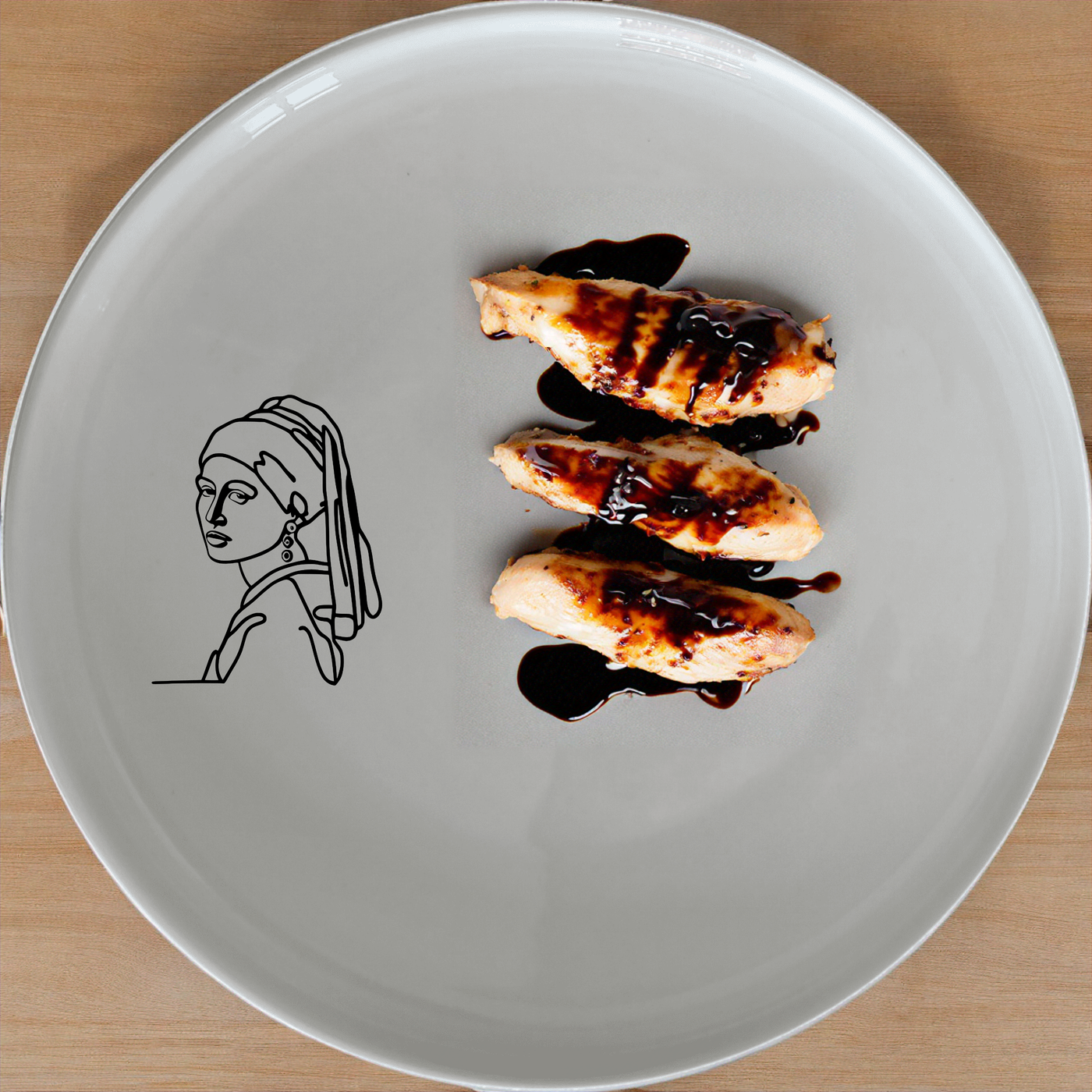 The Girl Pearl Earring Dinnerware Set of 12 - Range 1 combines timeless art with modern functionality, perfect for any dining occasion.