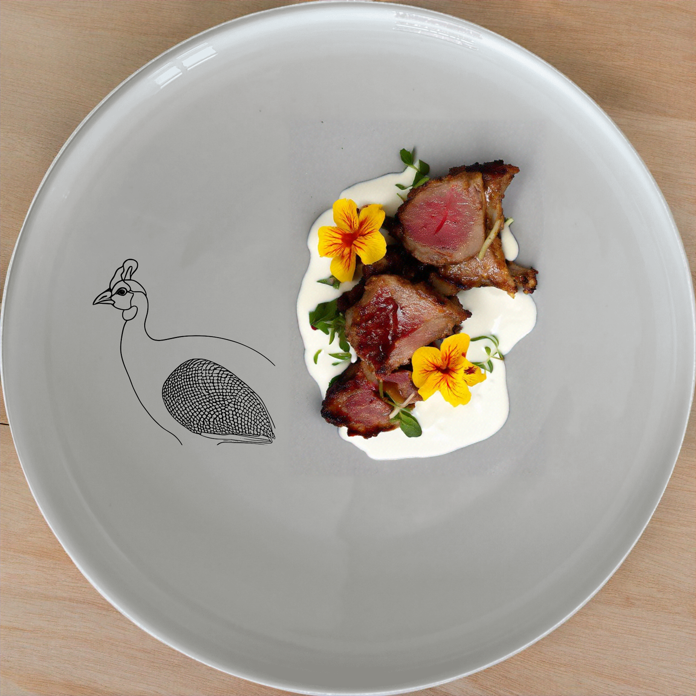 Discover the Helmeted Guineafowl Dinnerware Set of 12 - Range 4, a stylish and versatile collection perfect for any dining occasion.