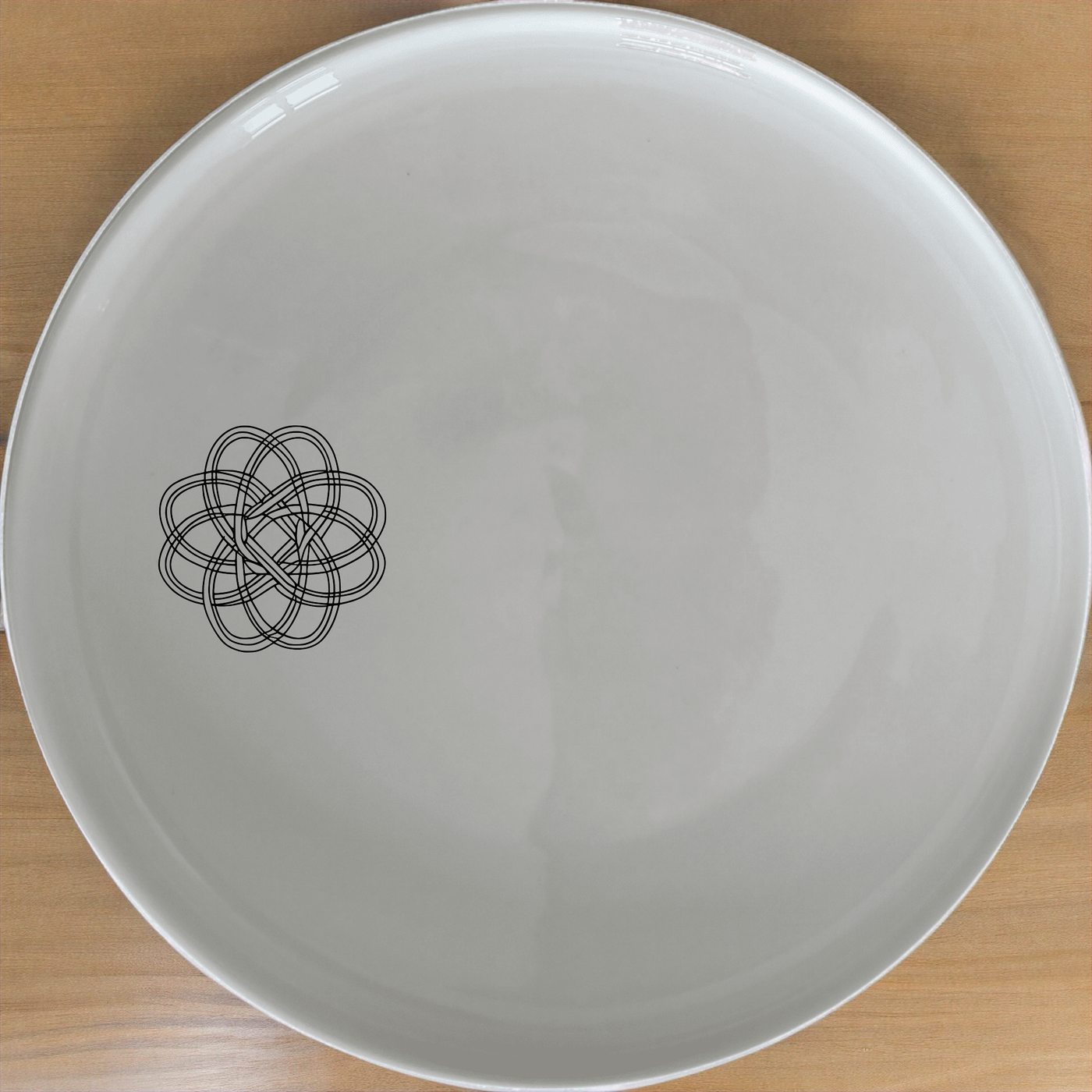 Geometric Knots Dinner Plate Set of 4 - Range 2 is a stylish and modern dinner plate set featuring intricate knot designs.
